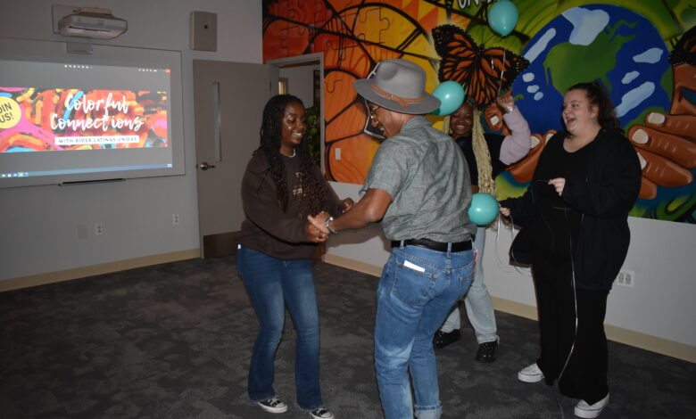 Students dance together at Colorful Connections