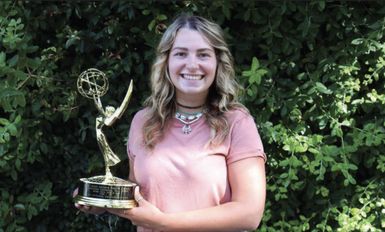 Rider alum Kaylee Ettinger ‘22 proudly holds her Emmy she won