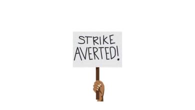Sign that reads "Strike Averted"