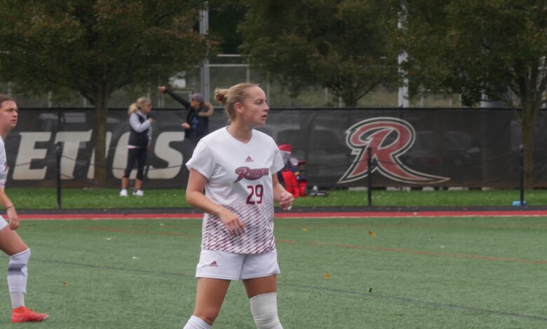 Graduate student midfielder Abbie Roberts looks on during the match.