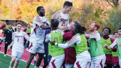 The Broncs celebrate after taking down the Marist Red Foxes to advance in the MAAC Tournament.