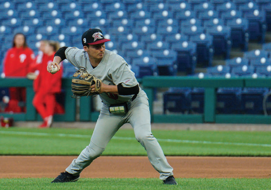 Baseball pitcher throws ball