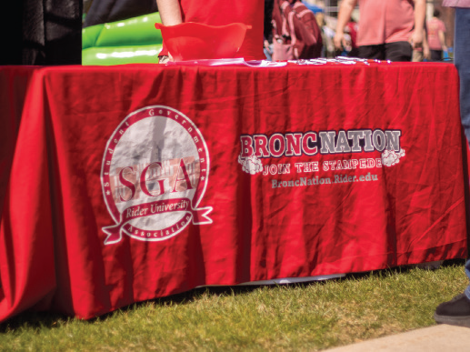 SGA in-person voting table at an event for 107.7 The Bronc.