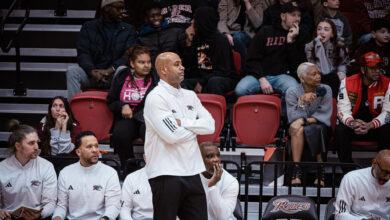 Head Coach Kevin Baggett crosses his arms as the Broncs take on the Red Foxes.