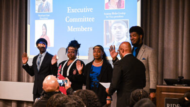 Greg Anthony Jones, Ashanti Motley, Ayanna Wells-Crudup and Naa’san Carr (left to right) stand alongside each other taking an oath for the new chapter.