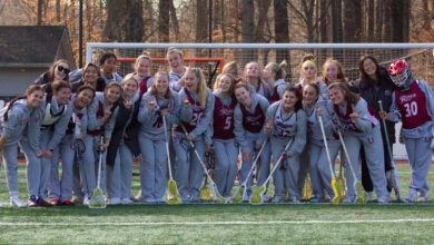 The first-ever Rider lacrosse team poses for a picture as it prepares for its first game. Photo by Maggie Kleiner