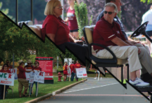 President Gregory Dell’Omo watching the faculty union picketing event during new student move-in.
