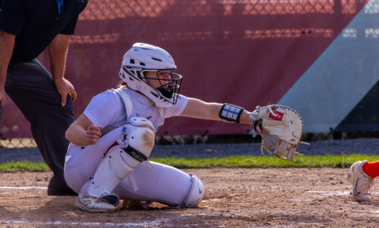 Junior catcher Kristyn Gardner trying to paint the corner for a strike. Carolo Pascale/The Rider News
