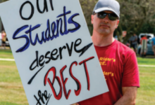 Tim Lengle, head athletic trainer, attended the picketing event on the day of new student move in.