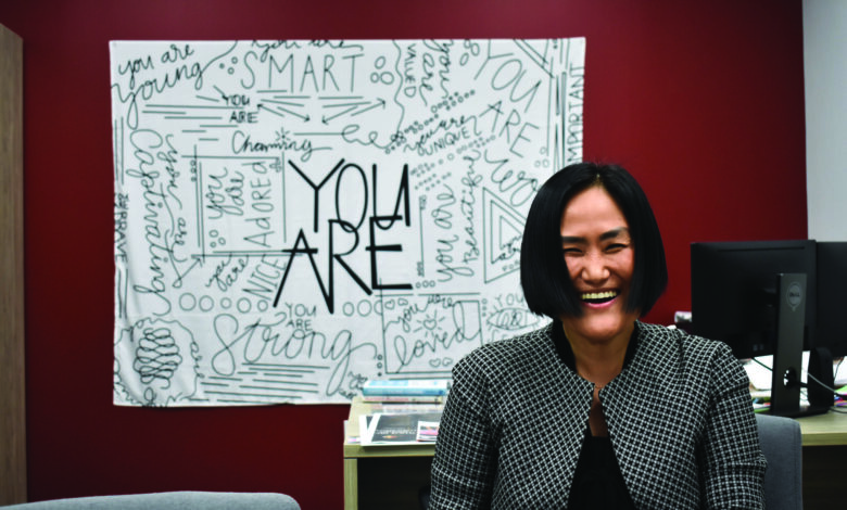 Chief Diversity Officer Heeyoung Kim sits in the CDI Director office that once belonged to former CDI Director Pamela Pruitt.