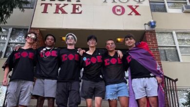 Members of Sigma Phi Epsilon stand in front of University House, where on-campus fraternities currently live.