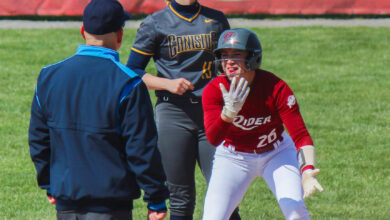 Sophomore outfielder Maddie Luedtke celebrates as she reaches second base. Photo by Maggie Kleiner/The Rider News