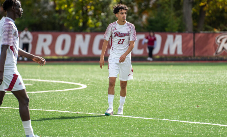 Graduate student midfielder Adel Al Masude scans the field.