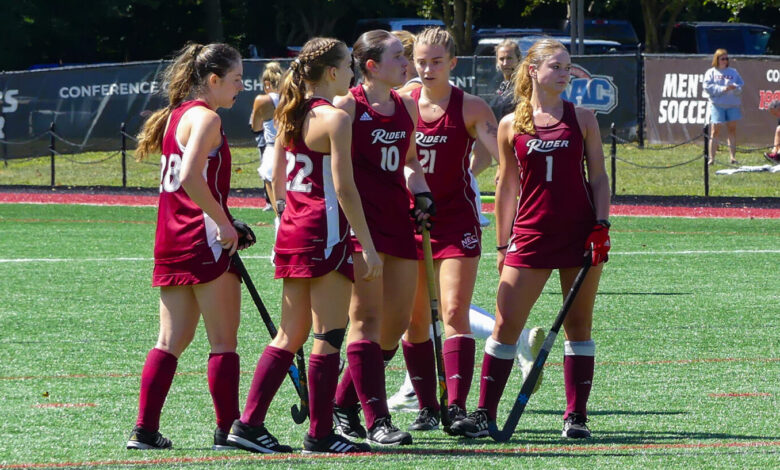 The Broncs gather at midfield during a stoppage of play. Photo courtesy of Alban Theunissen