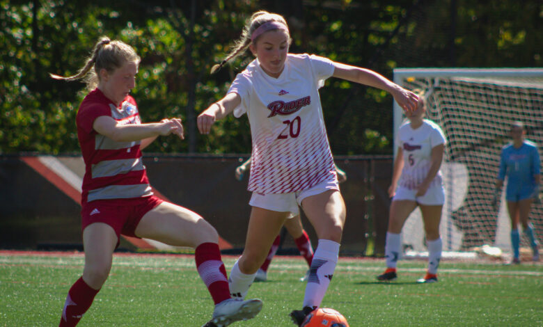 Freshman midfielder Ava DeGeorge takes the ball from the defender.