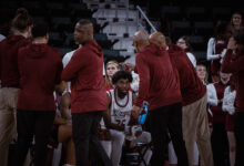 Graduate student guard T.J. Weeks takes a water break during the 2024 MAAC tournament. Photo by Josiah Thomas