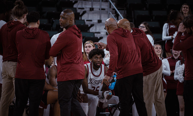 Graduate student guard T.J. Weeks takes a water break during the 2024 MAAC tournament. Photo by Josiah Thomas