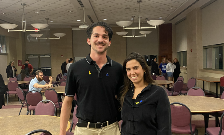 Ethan Handelman (left) and Liron Hacohen (right) pose for a photo.