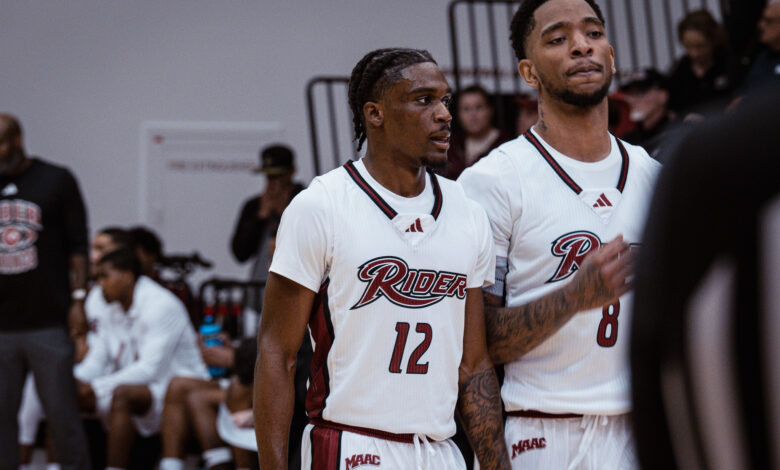 Junior guard Andre Young and senior forward Tank Byard catch their breath during a break. Photo by Josiah Thomas.