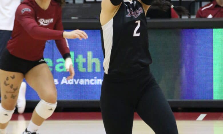 Junior libero Keegan O'Conner bumps the ball. Photo by Mathew Rodrigues.