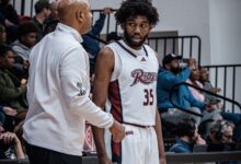 Graduate student guard T.J. Weeks Jr stops and discusses with Head Coach Kevin Baggett. Photo by Josiah Thomas