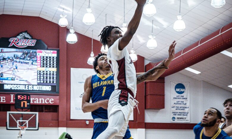 Junior guard Andre Young lays the ball in off the glass. Photo by Josiah Thomas