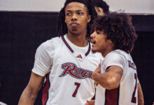 Sophomore guard Ife West-Ingram Jr (left) and sophomore guard Ruben Rodriguez (right) discuss a play on the court. Photo by Josiah Thomas/The Rider News