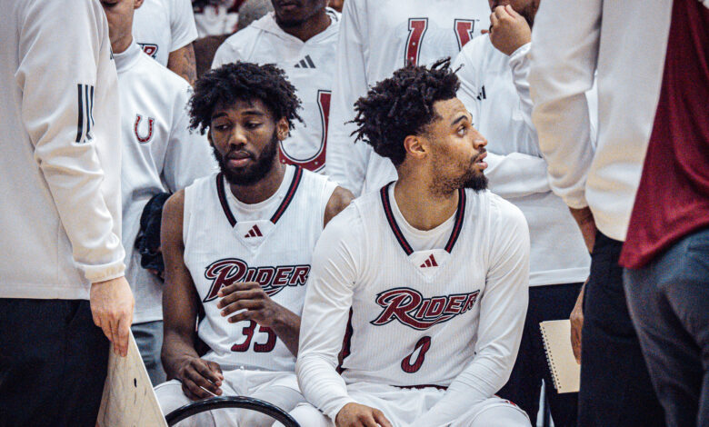 Graduate student guard T.J. Weeks Jr (left) sits on the bench along side junior guard Zion Cruz (right). Photo by Josiah Thomas/The Rider News