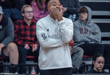 Head Coach Kevin Baggett takes in the action on the court. Photo by Josiah Thomas/The Rider News