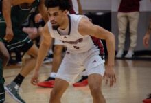 Junior guard Zion Cruz gets down in his defensive stance. Photo by Destiny Pagan/The Rider News