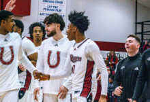 Freshman guard Flash Burton (right) put the Broncs on top with a 3-pointer with four seconds left to go. Photo by Josiah Thomas