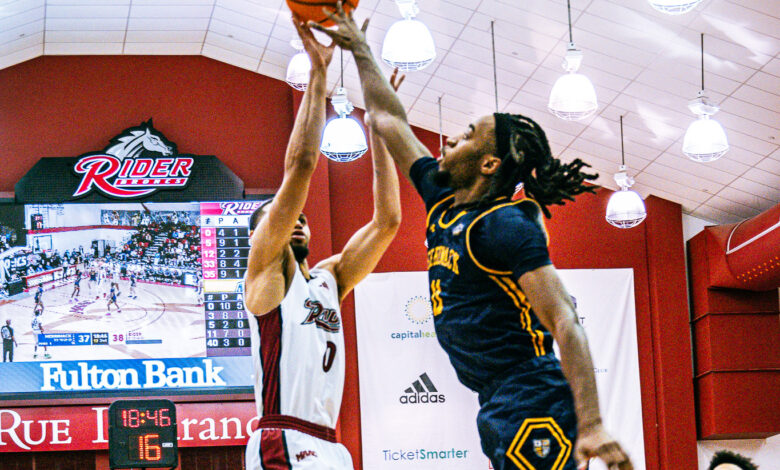 Junior guard Zion Cruz rises high for a jump shot. Photo by Josiah Thomas