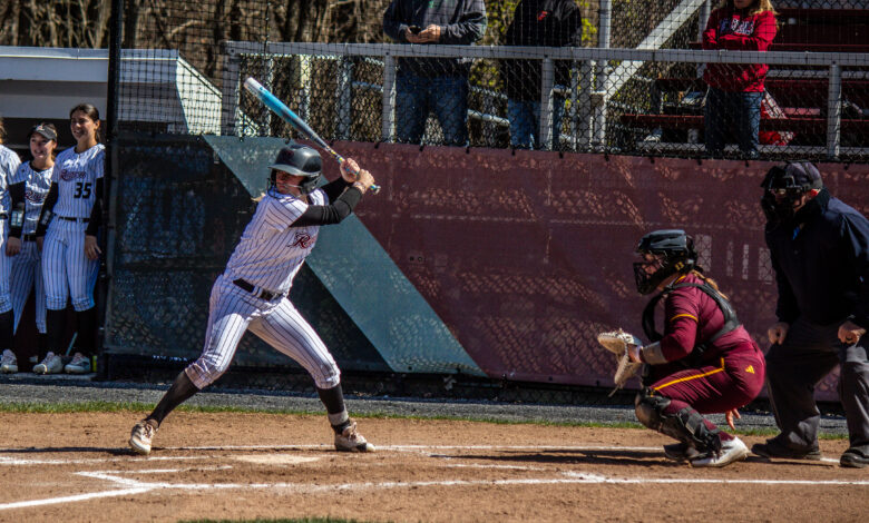 Junior pitcher Fallyn Stoeckel winds up for the incoming pitch. Destiny Pagan/The Rider News.