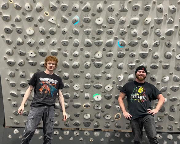 Brandon Renner (left) and Robert Wiedlich preparing to reach new heights at Rider’s rock climbing club. Photo courtesy of Brandon Renner.