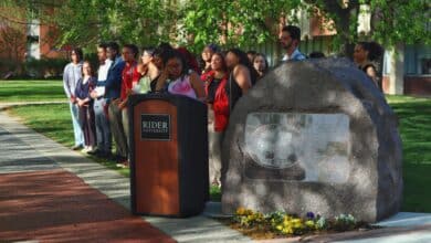 Students line up beside the Rider Rock for the closing of the newly named Ceremony of Unity, Legacy and Achievement. The event was a reworking of Rider's Multicultural Pre-Commencement. Jake Tiger/The Rider News