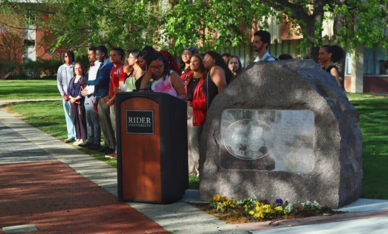 Students line up beside the Rider Rock for the closing of the newly named Ceremony of Unity, Legacy and Achievement. The event was a reworking of Rider's Multicultural Pre-Commencement. Jake Tiger/The Rider News