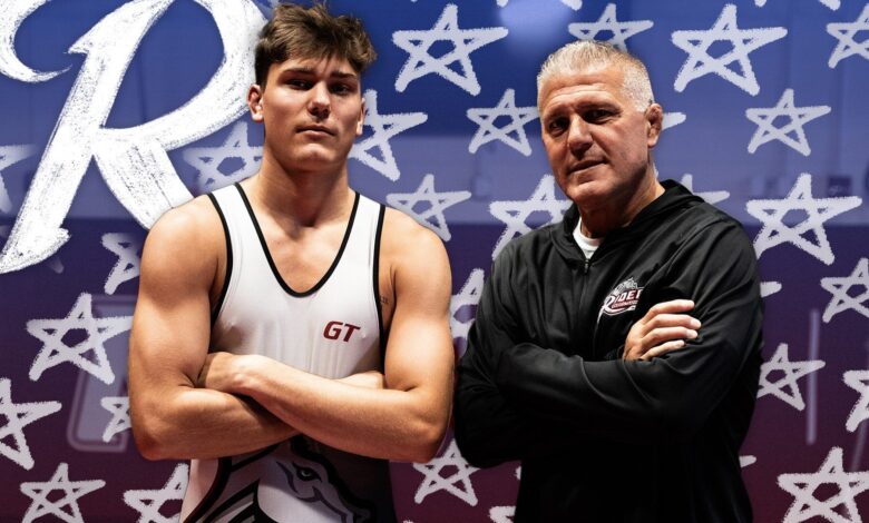 Sophomore JP Hangey (left) poses with his dad, Head Coach John Hangey. Photo courtesy of rob Ginda