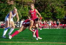 Senior defense Emma Bonshak holding possession of the ball. Photo by Derek Santos/The Rider News