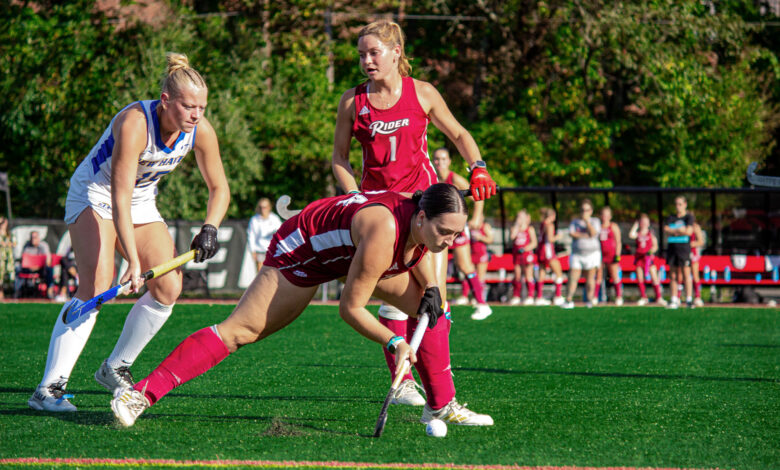 Senior defense Emma Bonshak holding possession of the ball. Photo by Derek Santos/The Rider News