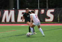 Junior forward Tess Ferrie making a move on her defender. Photo by Liliana R. Basille