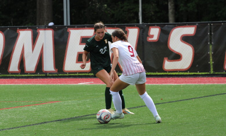 Junior forward Tess Ferrie making a move on her defender. Photo by Liliana R. Basille