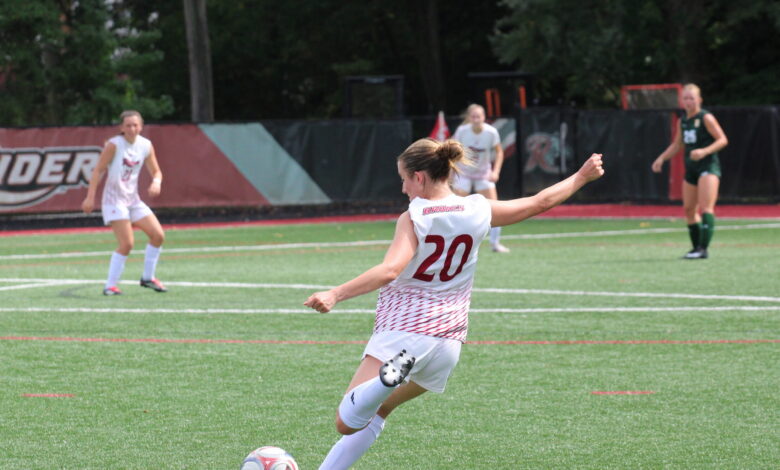 Junior midfielder Ava DeGeorge sending the ball into the box. Photo by Liliana R. Basille/The Rider News.