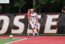 Sophomore midfielder Axel Lucas setting up for corner kick. Photo by Liliana R. Basile/The Rider News