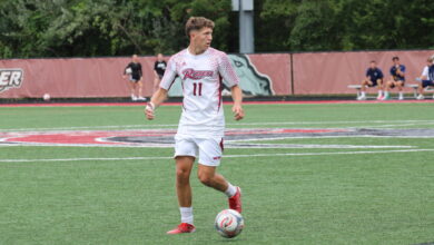 Sophomore midfielder Drew Heil surveys the field for a pass. Liliana R. Basille/The Rider News