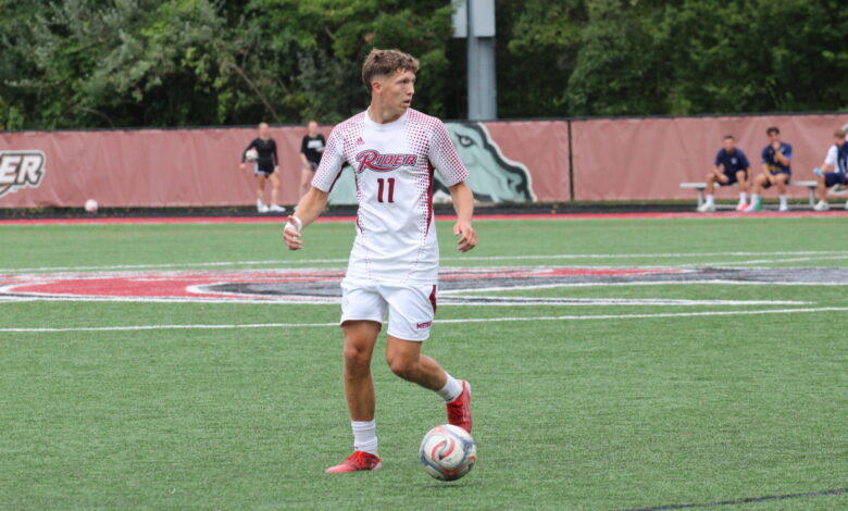 Sophomore midfielder Drew Heil surveys the field for a pass. Liliana R. Basille/The Rider News