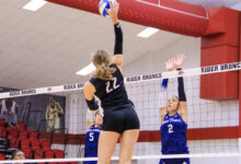 Senior right side Anja Kelly spikes the ball down. Photo courtesy of Faith Capolupo