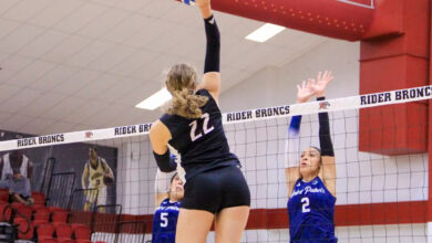 Senior right side Anja Kelly spikes the ball down. Photo courtesy of Faith Capolupo