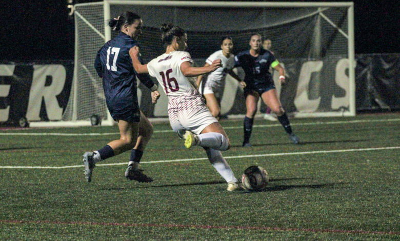 Senior forward Ava Ferrie sending the ball into the box. Photo by Liliana R. Basille