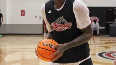 Senior forward Rich Brisco searching for the next pass. Photo by Liliana R. Basile/The Rider News
