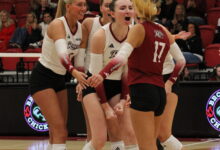 Freshman outside hitter Maisie Nawrocki celebrating a kill with her teammates. Photo by Liliana R. Basille/The Rider News.